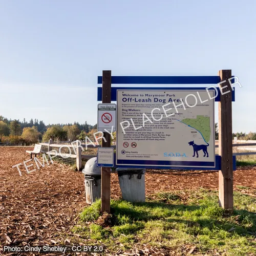 Entrance sign at an off-leash dog area (temporary placeholder photo)